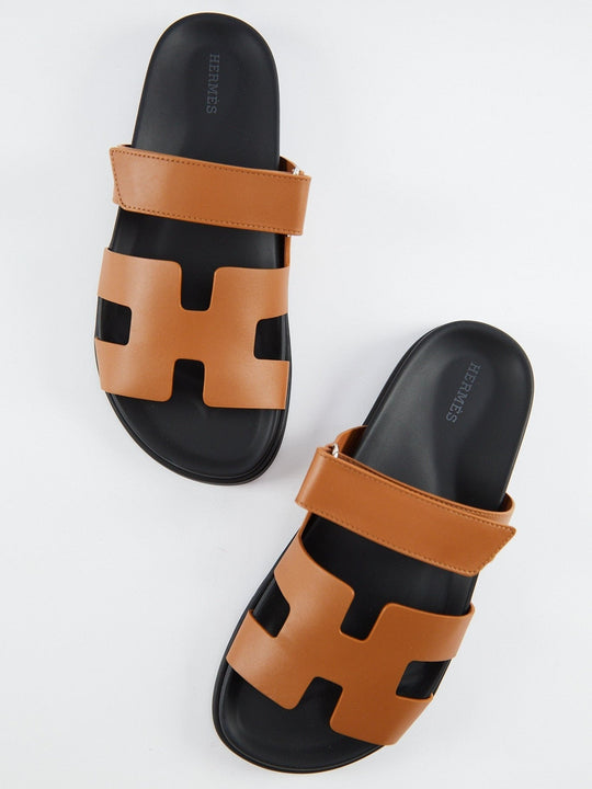 Hermès Chypre Sandals (Naturel/Black)