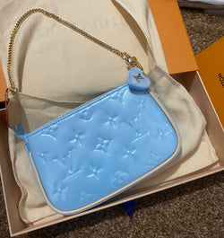 Louis Vuitton Lexington Handbag